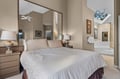 Upstairs Primary Suite, King with Ensuite Bathroom. Your bright bedroom suite features an ensuite bath and skylight, creating the perfect peaceful retreat for relaxation.