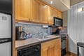 Your kitchen is fully equipped with everything you need to prepare meals—granite countertops, a stove, microwave, coffee maker, and plenty of cabinet storage. A stocked spice rack and full-sized fridge make cooking easy and convenient.